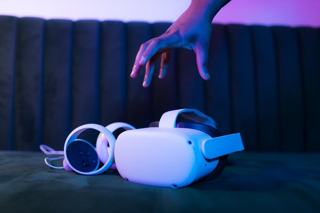 Woman with VR Headset and Touch Controllers